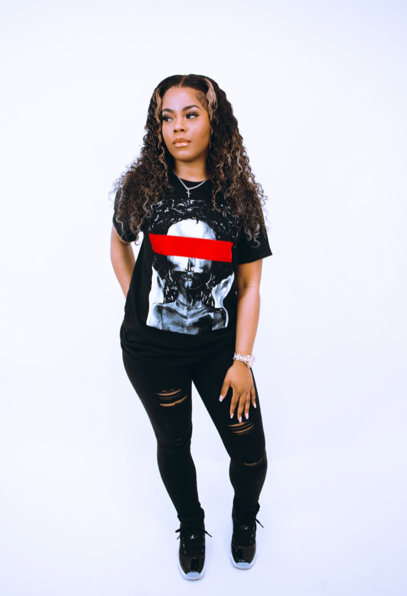 Black Tshirt with monochrome graphics, how to style t-shirt , 2023 fashion, red flock , red detailing